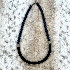 Necklace with bead and rope details